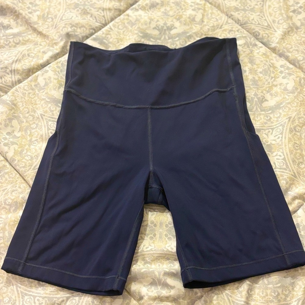 Athleta ultimate stash pocket 7” short
 Navy Blue Shorts